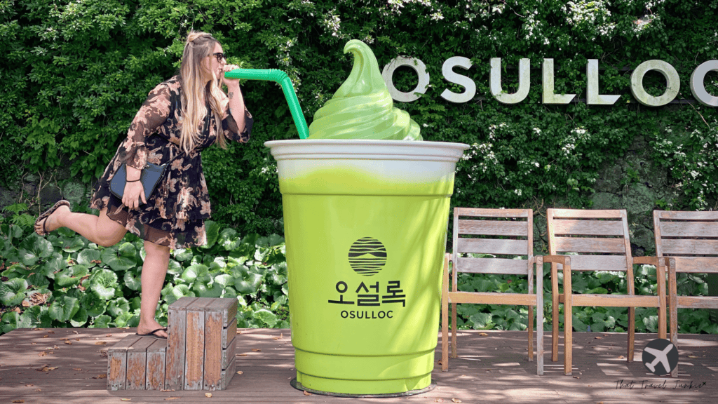 Standing with a life size green tea frozen matcha at the Osulloc Tea Museum in Jeju island, South Korea